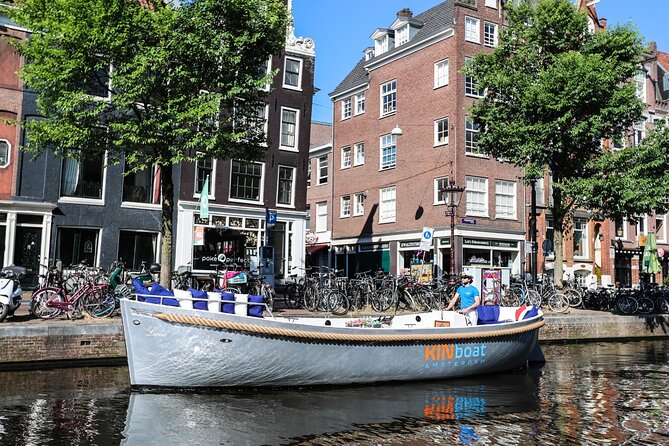 Amsterdam Canal Cruise in Open Boat With Local Skipper-Guide - Pricing and Reservations