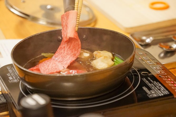 Small-Group Wagyu Beef and 7 Japanese Dishes Tokyo Cooking Class - Feasting on Dishes and Drinks