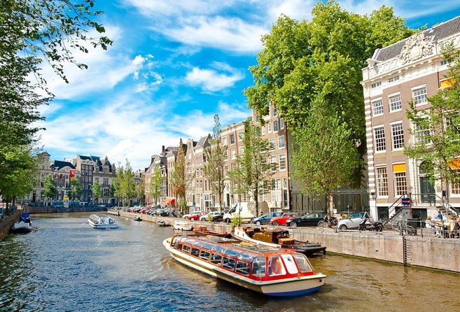 Amsterdam Canal Cruise With Live Guide and Unlimited Drinks - Key Points