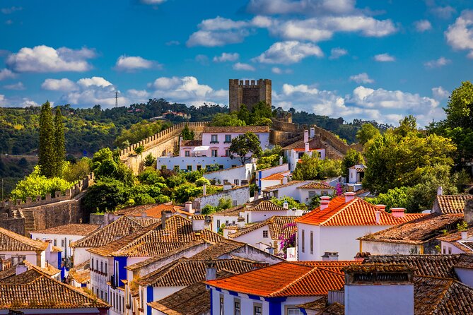 Three Cities in One Day: Porto, Nazare and Obidos From Lisbon - Guided Tours in Porto