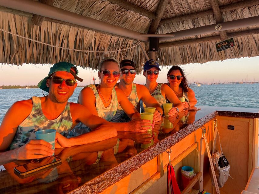 Key West: Private Tiki Boat Sunset Cruise - Language and Features