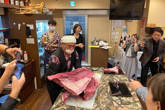 Tuna Cutting Show in Tokyo & Unlimited Sushi & Sake - Japanese Culinary Immersion