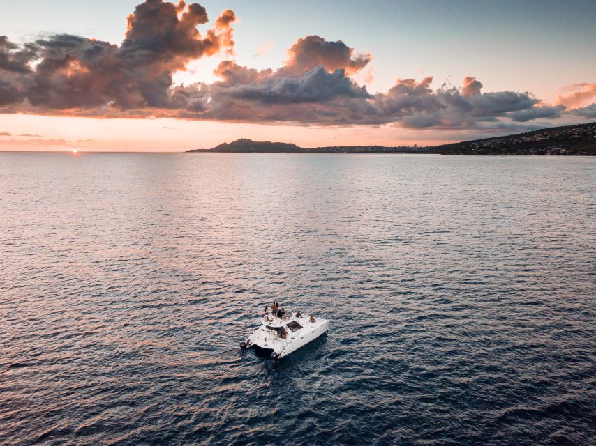 Oahu: Private Catamaran Sunset Cruise & Optional Snorkeling - Onboard Activities and Highlights