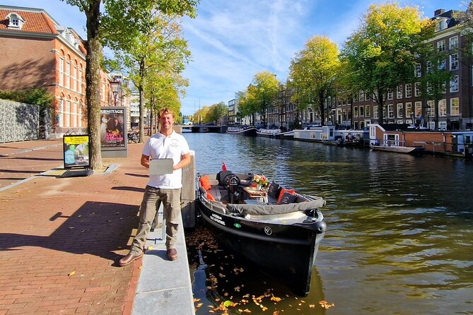 Amsterdam Canal Cruise on a Small Open Boat (Max 12 Guests) - Weather and Cancellation Policy