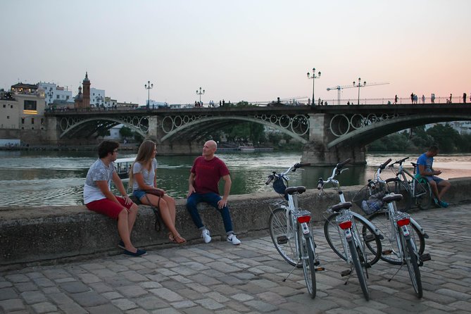 Sunset Guided Bike Tour in Seville - Guide Insights