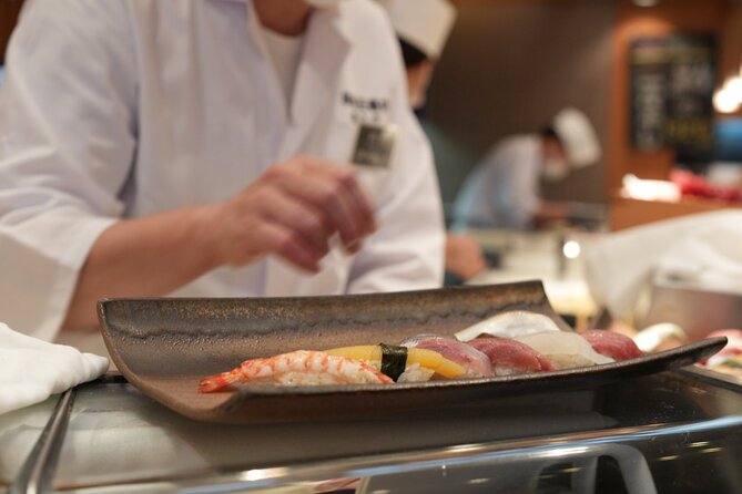 Tsukiji Market Eating Tour, Authentic Sushi & Sake Comparison - Exploring Delicacy-Filled Stalls