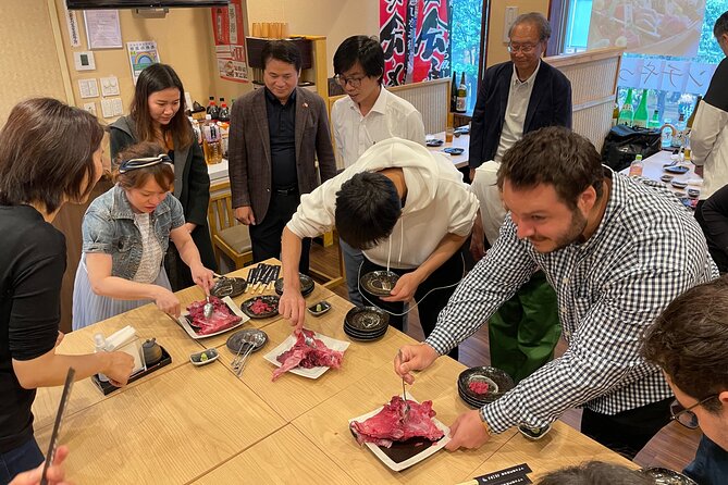 Tuna Cutting Show in Tokyo & Unlimited Sushi & Sake - Activity Description