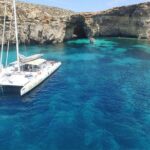 Full-Day Catamaran Cruise With Lunch in Island of Malta - Key Points