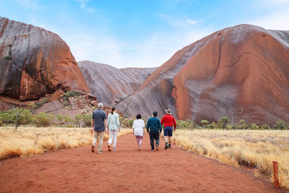 Uluru: Guided Walking Tour at Sunrise With Light Breakfast - Key Points
