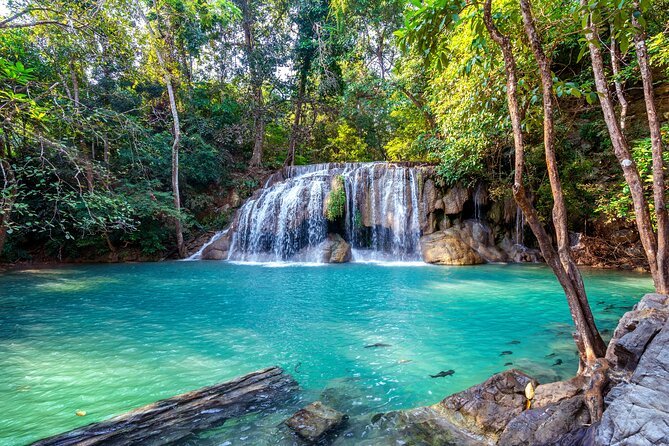 Boat Trip River Kwai and Erawan Falls Full Day Tour From Bangkok - Marveling at the Erawan Waterfalls