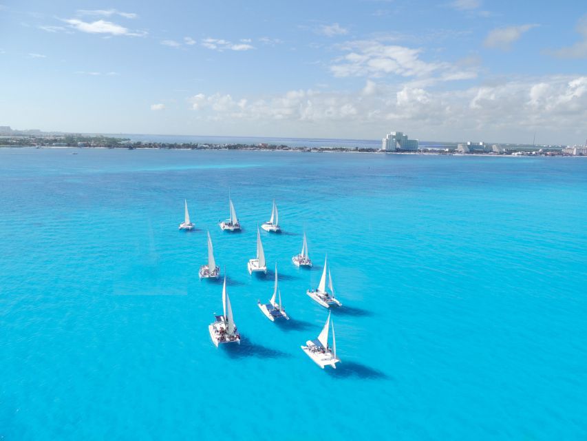 Cancún: Isla Mujeres Catamaran Sailing and Hotel Pick up