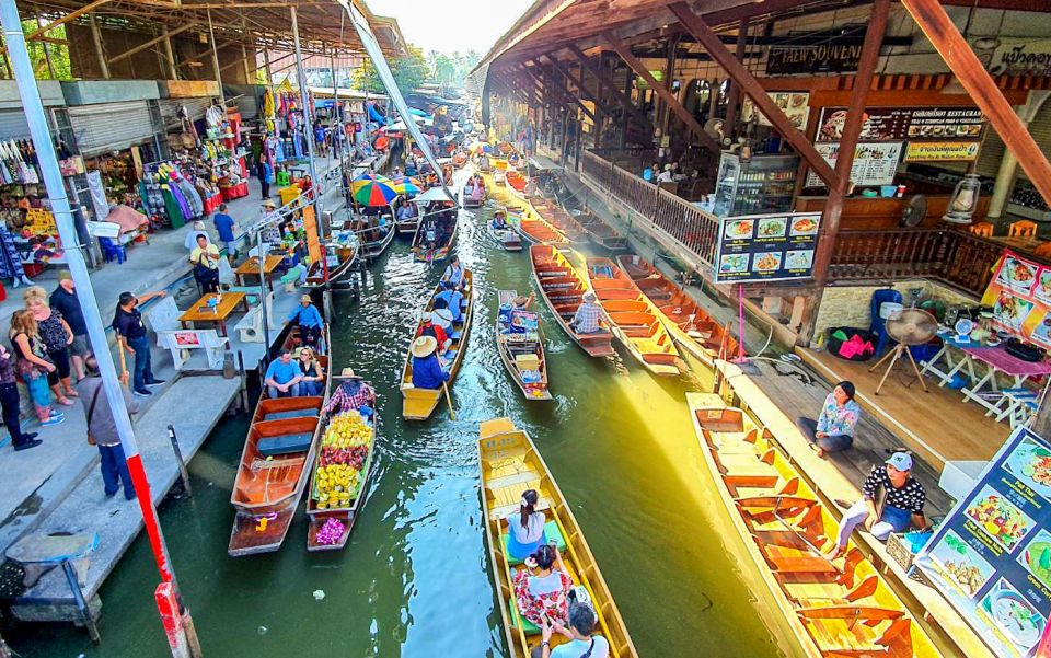 From Bangkok: Damnoen Saduak & Train Market Tour in English