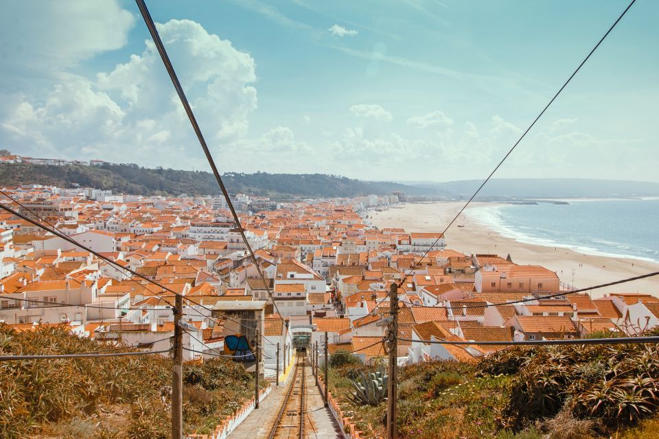 From Porto: Private Transfer to Lisbon With Stop at Nazaré