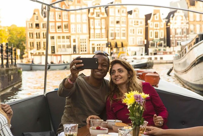 Private Romantic Canal Cruise Amsterdam With Bubbly and Snacks - Overview of the Experience