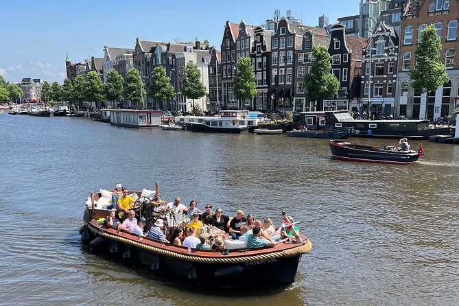 Amsterdam Luxury Boutique Boat Tour With Unlimited Beer and Wine - Admire Iconic Sights on the Canal