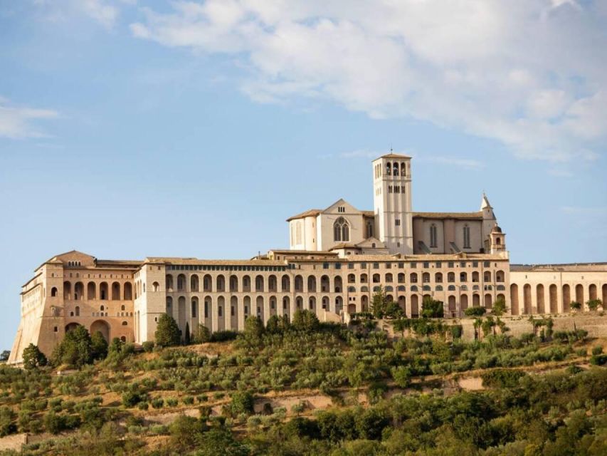 Day Trip to Assisi With Truffle Hunt & Lunch Bio From Rome - Pricing and Duration