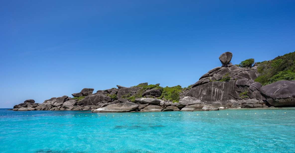 From Ao Nang: Similan Islands Boat Trip With Transfer & Food - Snorkeling in Crystal-Clear Waters