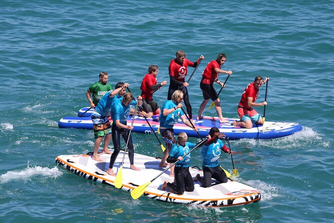 Giant Stand Up Paddle Boarding Experience in Newquay - Booking and Cancellation