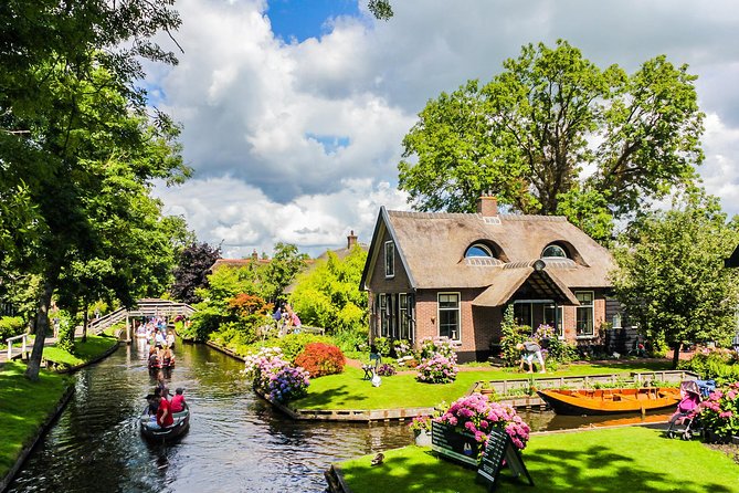 Giethoorn and Afsluitdijk Day Trip From Amsterdam With Boat Trip - Meeting Point and Duration