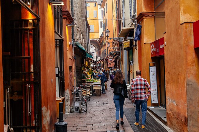 Highlights & Hidden Gems With Locals: Best of Bologna Private Tour - Lively Neighborhoods and Hidden Squares