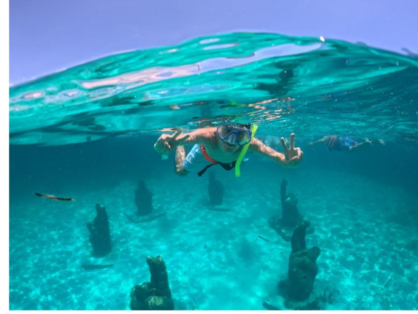 Isla Mujeres All Inclusive by Golden Caribean Catamaran - Sailing to Snorkel Site