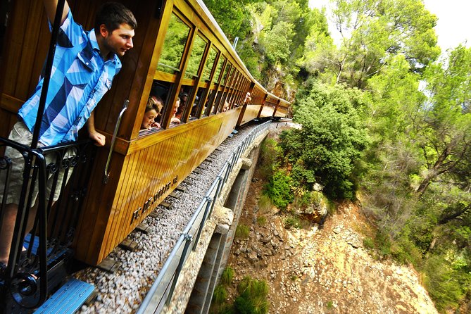 Mallorca in One Day Sightseeing Tour With Boat Ride and Vintage Train - Coastal Village of Port Soller