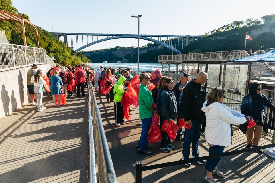 Niagara Falls, Canada: First Boat Cruise & Behind Falls Tour - Guided Walking Tour Highlights