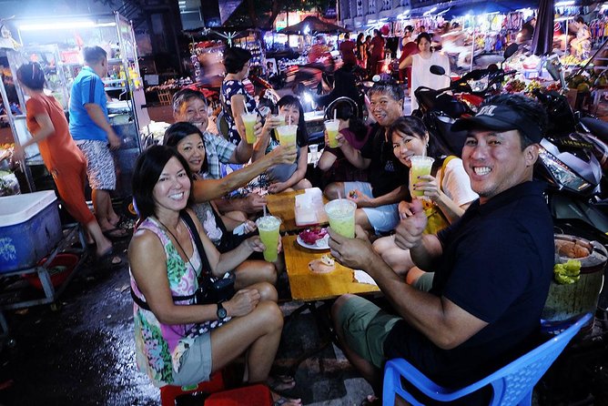 Saigon Night Sights & Local Food by Motorbike| Opt: Ao Dai Riders - Zip Through the City Streets