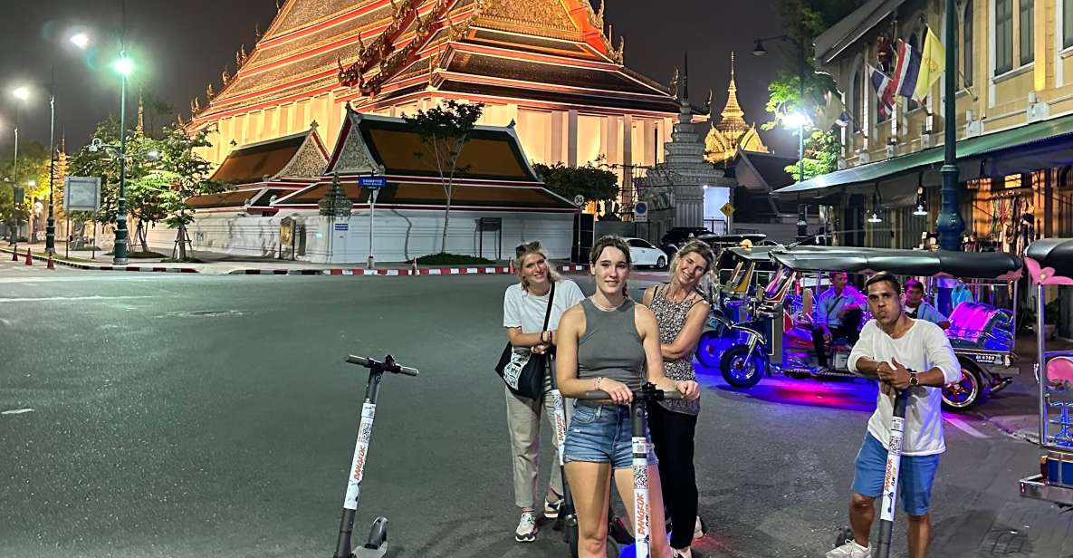 Bangkok: Electric Scooter Tour by Night - Visiting Iconic Temples and Landmarks