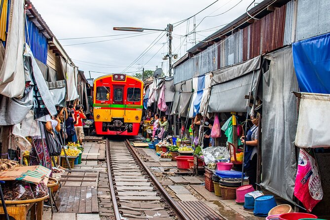 Damnoen Saduak Floating Market and Maeklong Railway Market Tour - Visiting Wat Bang Kung Chapel