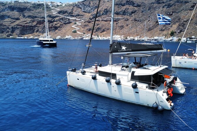 Half Day Premium Catamaran Cruise in Santorini Including Oia - Meeting and Pickup Options