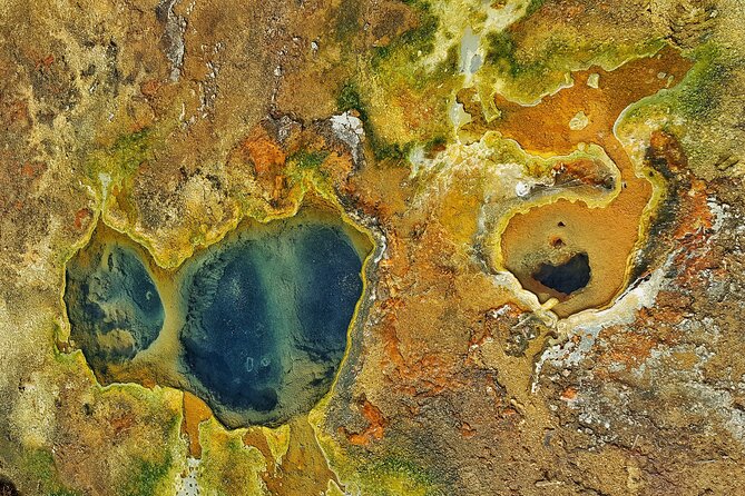 Helicopter Flight Over Geothermal Landscapes From Reykjavik - Aerial Views of Geysers and Craters