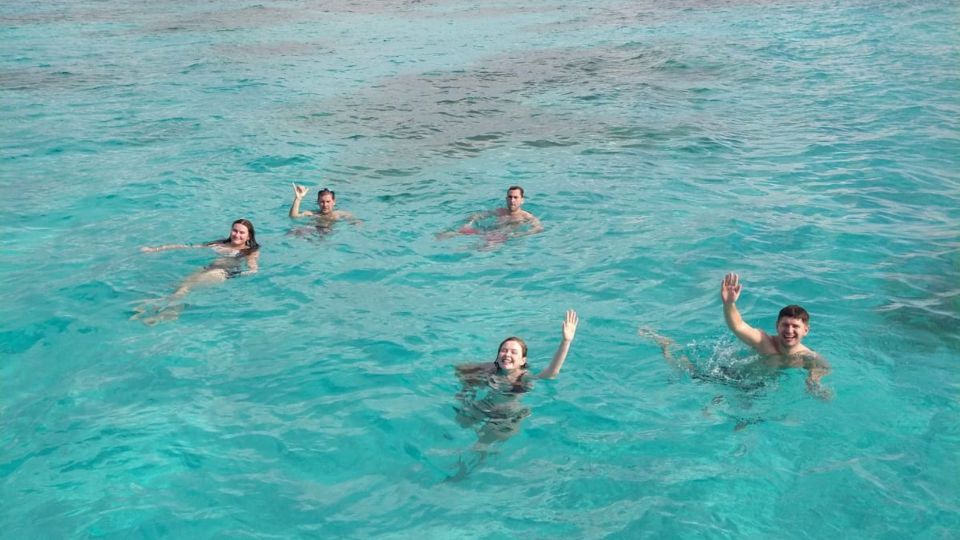 Isla Mujeres: Catamaran With Snorkel, Open Bar, and Transfer - Relaxing at Playa Norte