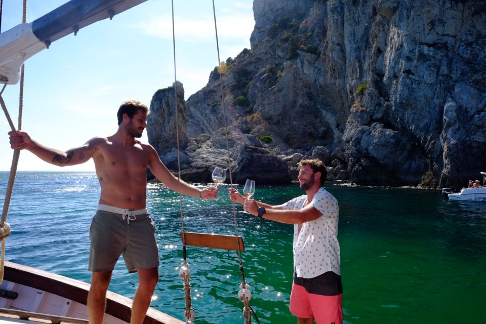 Sesimbra: Cliffs, Bays & Beaches Aboard a Traditional Boat - Traditional Wooden Vessel Tour