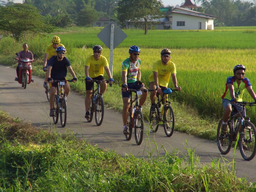 From Chiang Mai: Mae Taeng Valley and Waterfalls Cycle Tour - Exploring Wat Ban Den