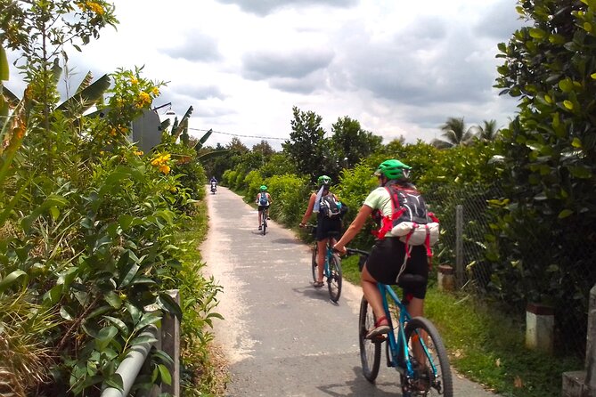 Full Day Experience Mekong Delta By Bike, Boat and Kayak. - Paddling a Kayak on the Mekong