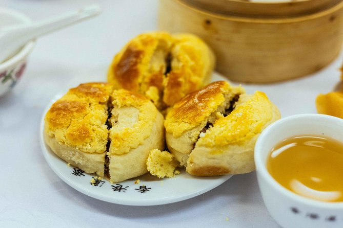 Highlights & Hidden Gems With Locals: Best of Hong Kong Private Tour - Towering Skyscrapers and Colonial Buildings