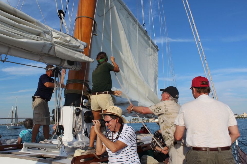 Key West: Schooner Full Moon Night Sail With Snacks & Drinks - Enjoying a Light Snack Onboard