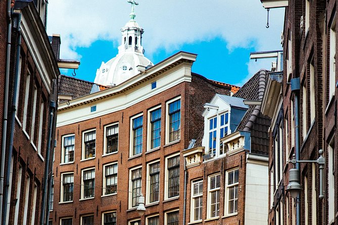 Private City Kickstart Tour: Amsterdam - Dam Square Action