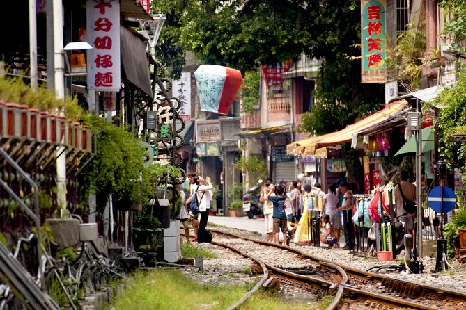 Private Jiufen & Pingxi Day Tour With English-Speaking Guide - Exploring Jiufen Village