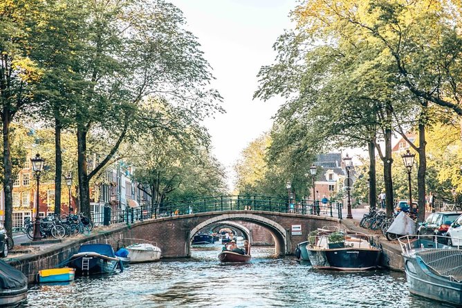 Private Romantic Canal Cruise Amsterdam With Bubbly and Snacks - Included Refreshments and Snacks