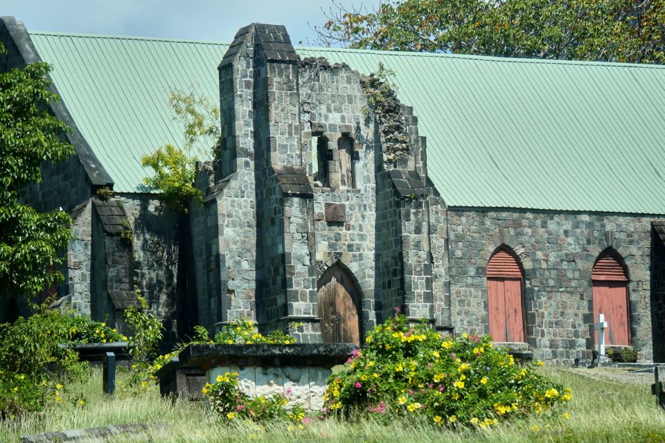 St. Kitts: Top Sights Guided Van or Open-Air Safari Tour - Enjoying Rum at Wingfield