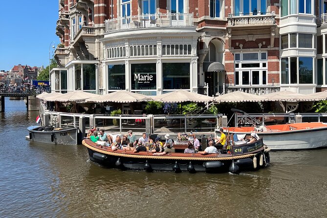 Amsterdam Luxury Boutique Boat Tour With Unlimited Beer and Wine - Convenient Central Meeting Location