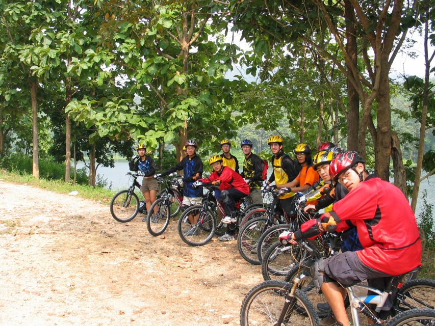 Chiang Mai: Rainforest Guided Mountain Biking Tour - Stops for Photos, Swimming, and Lunch