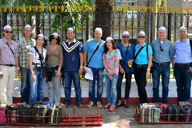 Dabbawala, Dhobi Ghat & Dharavi Slum Tour With Local Train Ride - Encountering Dabbawalas