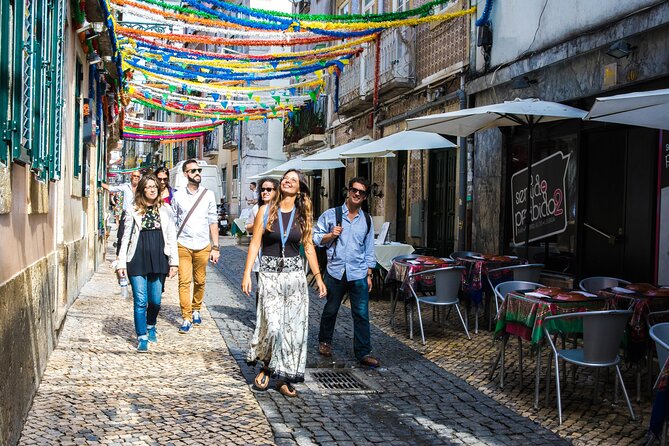Lisbon Small-Group Walking Tour: Wine, Seafood Lunch, Ferry Ride - Learning About Lisbons History