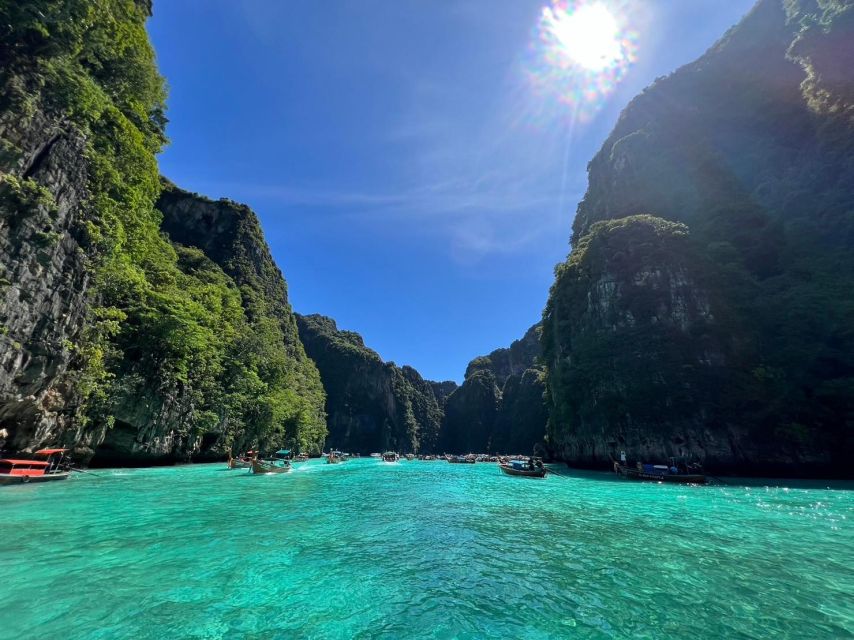 Phi Phi Island: Sunrise Longtail Boat Tour With Snorkeling - Pileh Lagoon Experience