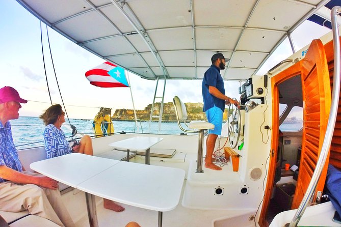 San Juan Catamaran Sunset Sail With Drinks Included - Complimentary Drinks and Relaxation