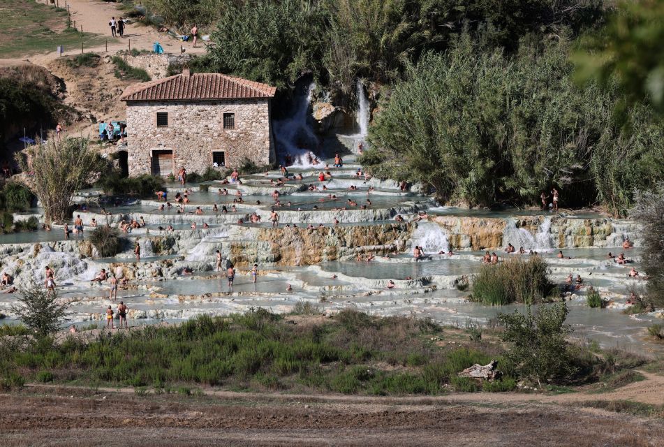 Saturnia Waterfalls and Pitigliano by Bus With Environmental Guide - Picking Up and Dropping Off