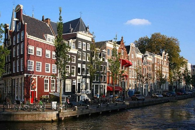 Secrets of Amsterdam Walking Tour Plus Dutch Sweets Tasting - Tour Duration and Capacity